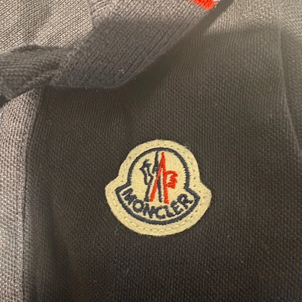 Moncler Navy Long Sleeve Polo with Red & White Trim Detail